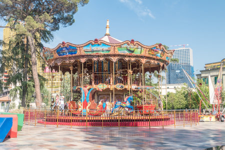 Tirana, Albania - June 4, 2022: Carousel on Skanderbeg Square.のeditorial素材