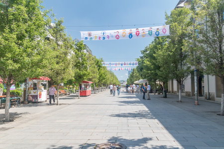 Pristina, Kosovo - June 5, 2022: Main avenue of the city named after Mother Teresa (Nena Tereze).のeditorial素材