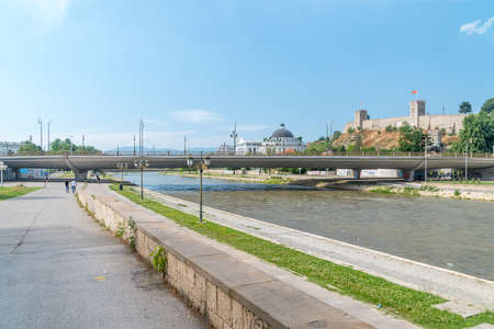 Skopje, North Macedonia - June 5, 2022: Vardar river with bridge in Skopje.の写真素材
