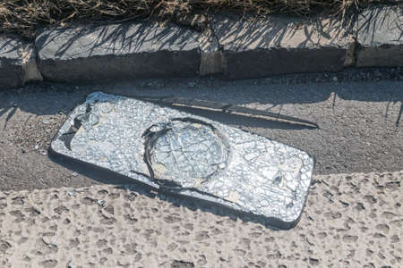 Broken truck side mirror on the street.の写真素材