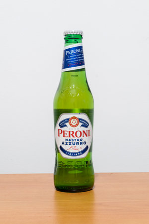 Pruszcz Gdanski, Poland - November 27, 2022: Bottle of Italian Peroni Nastro Azzurro beer.のeditorial素材