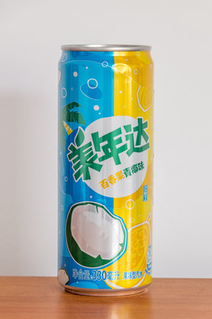 Pruszcz Gdanski, Poland - May 6, 2023: Can of Mirinda from China. Passion fruit and coconut flavor Mirinda.のeditorial素材