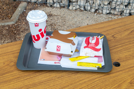 Dommartin-les-Toul, France - June 19, 2023: XL Combo menu in Quick France restaurante. Menu with Supreme Bacon sandwich, French fries and Coca-cola.のeditorial素材