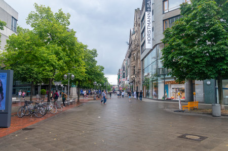 Hanover, Germany - July 29, 2023: Pedestrian street in city center of Hanover at rainy day.のeditorial素材