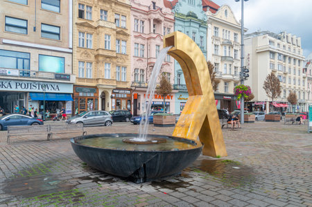 Pilsen, Czech Republic - August 26, 2023: Golden water fountain in city center of Pilsen.のeditorial素材