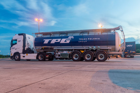 Bad Salzuflen, Germany - August 18, 2023: TPG Trans Polonia Group truck in the evening.のeditorial素材