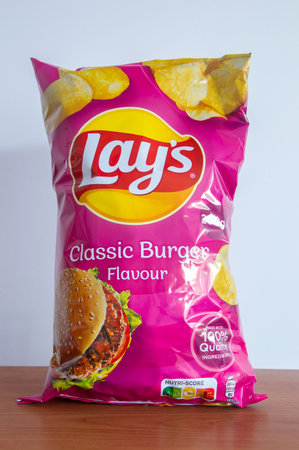 Pruszcz Gdanski - December 25, 2023: Pack of Lays Classic Burger flavor.のeditorial素材