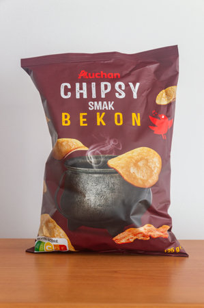 Pruszcz Gdanski, Poland - February 3, 2024: Pack of Auchan potato bacon flavor chips.のeditorial素材