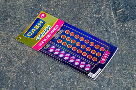 Antwerp, Belgium - February 24, 2024: Belgian scratch card lottery ticket.のeditorial素材