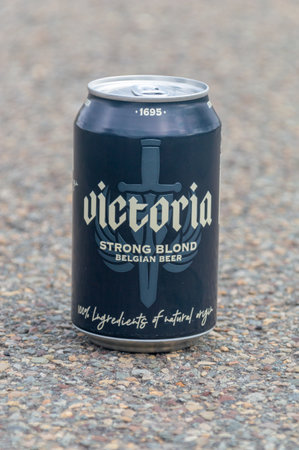 Antwerp, Belgium - February 24, 2024: Can of Victoria strong blond Belgian beer.のeditorial素材
