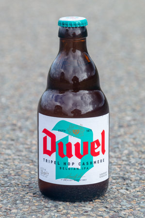 Antwerp, Belgium - February 24, 2024: Bottle of Duvel tripel hop cashmere Belgian IPA.のeditorial素材