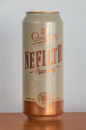 Pruszcz Gdanski, Poland - March 15, 2024: Can of Czech Staropramen Nefiltr Psenicny beer. Unfiltered light wheat lager beer.のeditorial素材