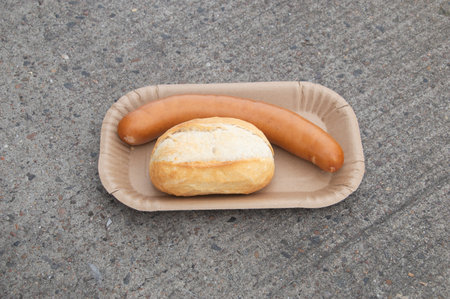 German sausage Bockwurst with roll. German street food.の写真素材