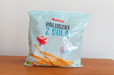 Pruszcz Gdanski, Poland - April 1, 2024: Auchan salted sticks.のeditorial素材