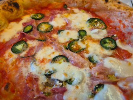 Spicy Neapolitan pizza. Neapolitan pizza with spicy peppers.の写真素材