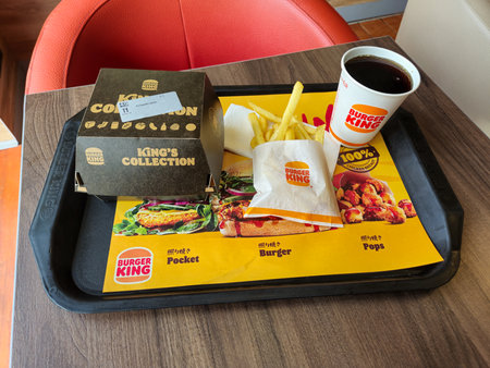 Zarska Wies, Poland - June 30, 2024: King's Whiskey BBQ burger french fries and Pepsi at Burger King restaurant.のeditorial素材