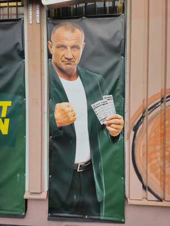 Lublin, Poland - August 3, 2024: Mariusz Pudzianowski at Bet Fan advertisement.のeditorial素材