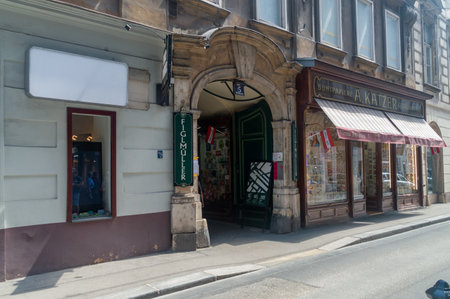 Vienna, Austria - June 8, 2024: Entrance to Figlmuller restaurant with famous Wiener Schnitzel.のeditorial素材