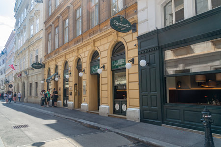 Vienna, Austria - June 8, 2024: Figlmuller restaurant with original Wiener Schnitzel.のeditorial素材