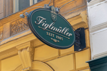 Vienna, Austria - June 8, 2024: Logo of famous Figlmuller restaurant with original Wiener Schnitzel.のeditorial素材