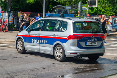 Vienna, Austria - June 8, 2024: Austrian police (Polizei) car during Vienna Pride.のeditorial素材