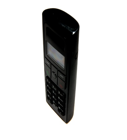 The black phone on the white background.の写真素材