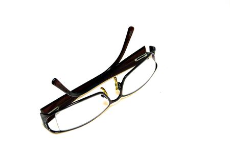 The pair of glasses on the white background.の写真素材