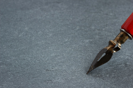 Vintage pen writing in stoneの写真素材