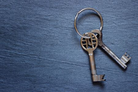 Bunch of keys on dark backgroundの写真素材