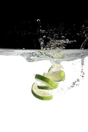limes in waterの写真素材