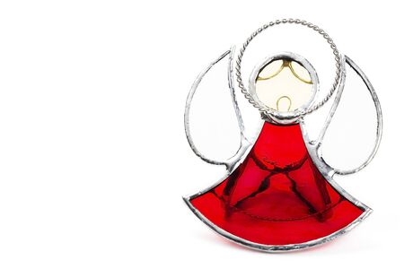lead glass angel figurine on white backgroundの写真素材