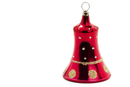 red christmas ornament in bell shape on white backgroundの写真素材
