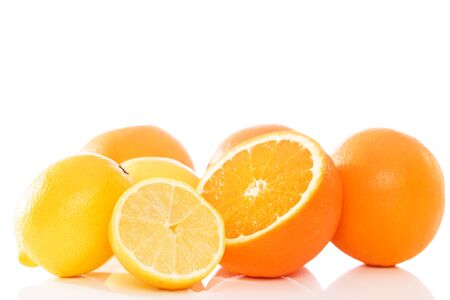 oranges and lemons on white backgroundの写真素材