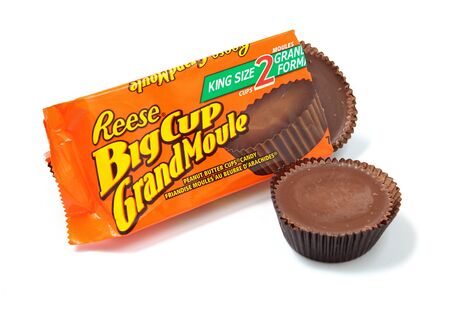 Toronto, Canada - May 10, 2012: This is a studio shot of Reese Big Cup peanut butter candy made by Reese, a subsidiary of The Hershey Company, isolated on a white background.のeditorial素材