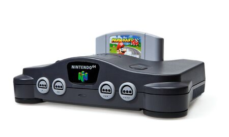 Toronto, Canada - September 10, 2012: This is a studio shot of a Nintendo 64 game console and Mario...