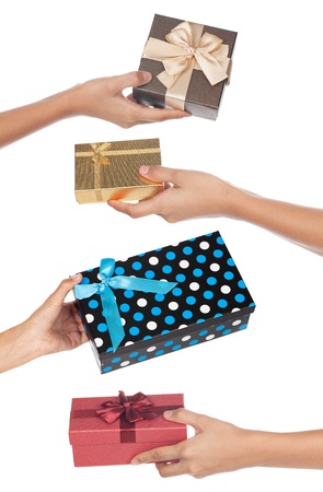 Four gifts being given back and forth isolated on a white background.の写真素材