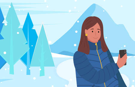 Woman on winter vacations by mountains. Female character taking photo of natural beauty on...