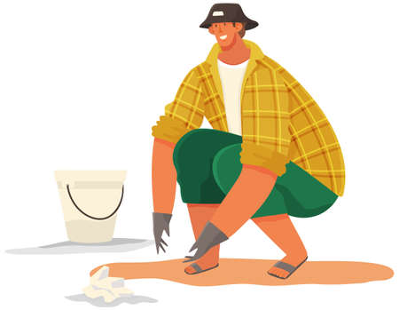 Character throwing trash and paper waste into bucket. Volunteer man is cleaning sand on beachのイラスト素材