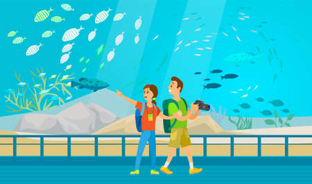 People making photo of underwater scenery with sea animals in aquarium. Oceanarium visitors look at fish in aquarium, underwater fauna. Couple with camera takes pictures of fishes oceanariumのイラスト素材