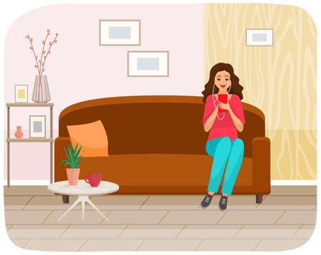 Woman sitting on sofa holds smartphone in her hand. Casual lady in headpones listening to music and browsing social media on mobile device. Girl on couch uses phone for chatting and surfing internetのイラスト素材