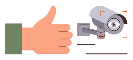 Hand making a thumbs-up sign beside a security camera in focus. Ideal for safety, surveillance,...
