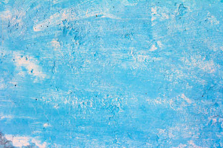 Rough blue abstract grunge vintage texture with paint strokes on aged old wall. High quality photoの写真素材