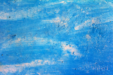 Rough blue abstract grunge vintage texture with paint strokes on aged old wall. High quality photoの写真素材