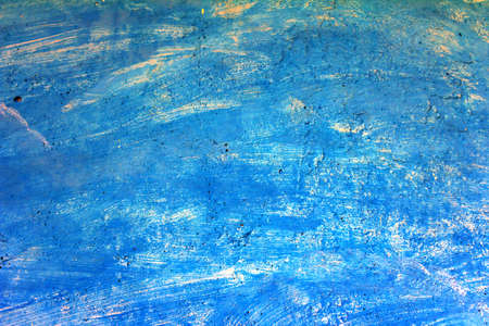 Rough blue abstract grunge vintage texture with paint strokes on aged old wall. High quality photoの写真素材