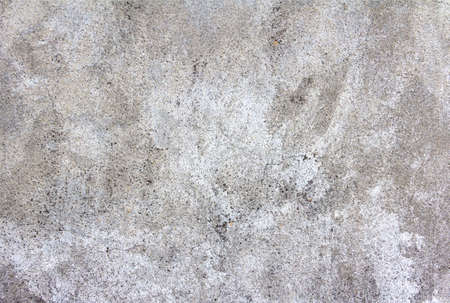 Abstract background with gray natural concrete wall texture. Grey washed cement surface. High quality photoの写真素材