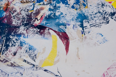 A Torn Advertisement Background from Old Postersの写真素材