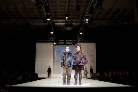 VALENCIA, SPAIN - JANUARY 21: Unknown child models at the FIMI Children's Winter Fashion Show with the designer Lea Lelo on the runway in the Feria Valencia on January 21, 2011 in Valencia, Spain.のeditorial素材