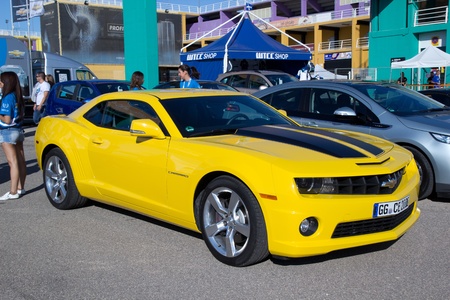 VALENCIA, SPAIN - SEPT 3: A 2011 Chevrolet Camaro from the movie Transformers, Autobot Bumble Bee, on display at the FIA World Touring Car Championship on September 3, 2011 in Valencia, Spain.のeditorial素材