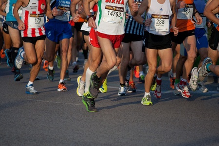 VALENCIA, SPAIN - NOV 27: Runners compete in the 31st Divina Pastora Valencia Marathon on November 27, 2011 in Valencia, Spain.のeditorial素材