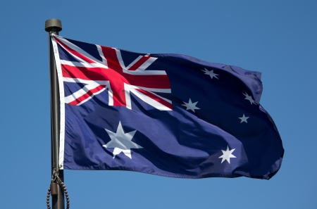 The Australian Flag with blue sky backgroundの写真素材